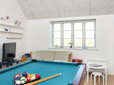 a living room with a pool table at 10 person holiday home in Harboøre-By Traum in Harboør