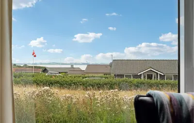 a view of a house from a window at Nice Home In Vinderup With Sauna in Vinderup