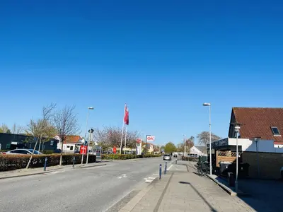 an empty street in a small town with houses at aday - Elegant Apartment with Terrace in Svenstrup