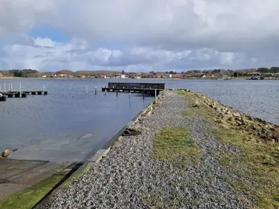a dock in the middle of a body of water at 8 person holiday home in Højslev-By Traum in Højslev