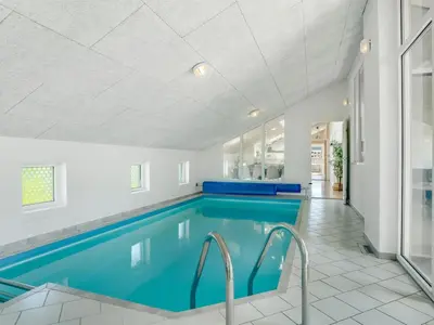 a swimming pool in a house at Holiday Home Jenvold - 600m from the sea by Interhome in Torsted