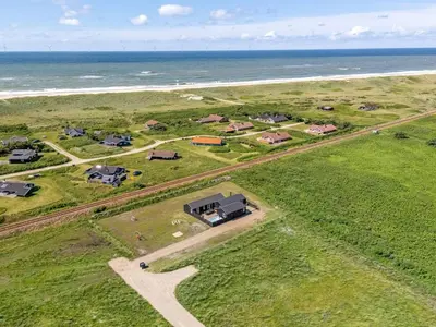 an aerial view of a house near the beach at Holiday Home Ivar - 300m from the sea by Interhome in Harboør