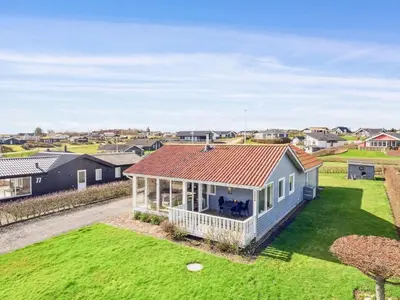 an overhead view of a house with a red roof at Holiday Home Ormar - 100m to the fjord by Interhome in Lemvig