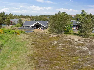 an aerial view of a house with a yard at Holiday Home Myrte - 900m from the sea by Interhome in Torsted
