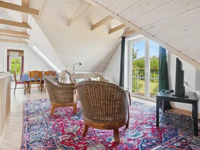 a living room with a table and chairs at Apartment Dietlinde - 1-3km to the fjord by Interhome in Thyholm