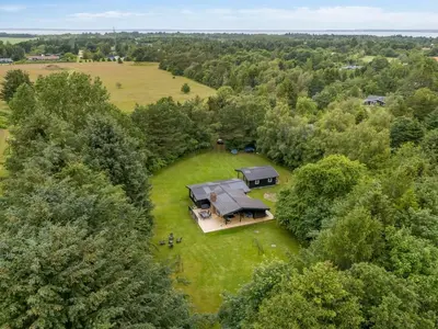 an overhead view of a house in the middle of a field at Holiday Home Gudrid - 250m to the fjord by Interhome in Højslev