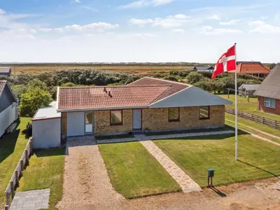 an image of a house with a canadian flag at Holiday Home Ingward - 750m from the sea by Interhome in Vestervig