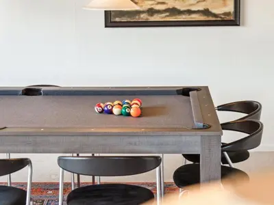 a ping pong table with four balls on it at Holiday Home Ingward - 750m from the sea by Interhome in Vestervig