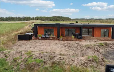 a house in the middle of a field at Awesome Home In Thisted With Sauna in Thisted