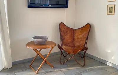 a bowl sitting on a table next to a chair at 2 Bedroom Awesome Home In Vestervig in Vestervig