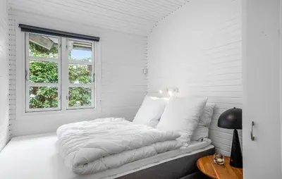 a white bedroom with a bed and a window at Cozy Home In Løgstrup With Wifi in Løgstrup
