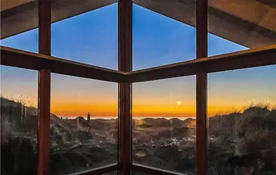 a view from a window looking out at the sunrise at Beautiful Home In Saltum in Saltum