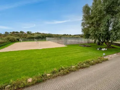 a park with a tennis court and a field of grass at Apartment Alvy - 100m to the fjord by Interhome in Lemvig