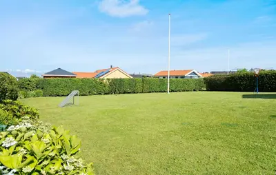 a soccer field with a goal in the grass at Beautiful Home In Vinderup With Sauna in Vinderup