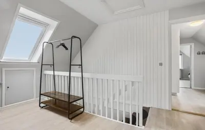 a white room with a staircase and a window at Lovely Home In Vestervig With Wifi in Vestervig