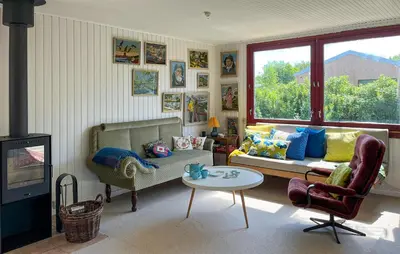 a living room with a couch and a table at 3 Bedroom Gorgeous Home In Vinderup in Vinderup