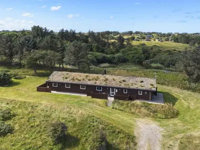 an overhead view of a barn in a field at Holiday Home Joris - 1-5km from the sea by Interhome in Løkken