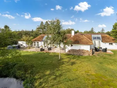 an image of a house with a yard at Holiday Home Verner - 900m from the sea by Interhome in Fjerritslev