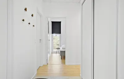 a hallway of a home with white walls and wood floors at Gorgeous Home In Thisted With Wifi in Thisted