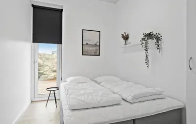 a white bedroom with a white bed and a window at Gorgeous Home In Thisted With Wifi in Thisted