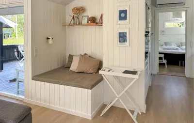 a small room with a bed in the corner at 3 Bedroom Cozy Home In Thisted in Thisted