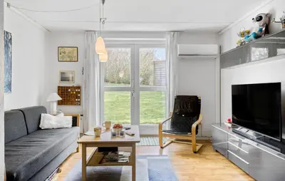 a living room with a couch and a tv at 2 Bedroom Nice Apartment In Lemvig in Lemvig