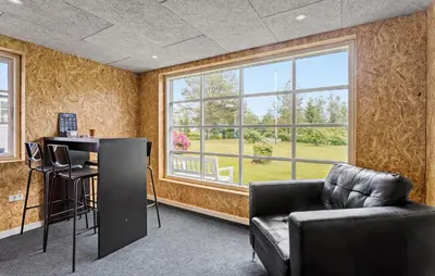an office with a couch and a desk and a window at 3 Bedroom Pet Friendly Home In Højslev in Højslev