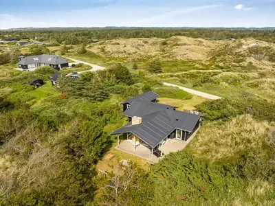 an overhead view of a house in a field at Holiday Home Selenia - 1km from the sea by Interhome in Saltum