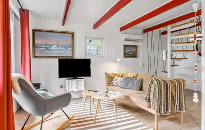 a living room with a couch and a table at 2 Bedroom Gorgeous Home In Saltum in Saltum