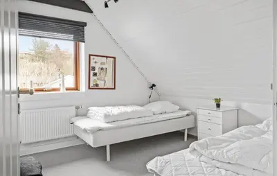 two beds in a white room with a window at Pet Friendly Home In Lemvig With Wifi in Lemvig