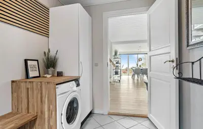 a laundry room with a washer and dryer at Stunning Home In Spøttrup With Wifi in Spottrup
