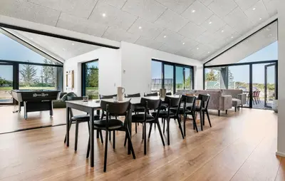a dining room with a table and chairs at Stunning Home In Saltum With Sauna in Saltum
