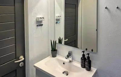 a bathroom with a sink and a mirror at Amazing Home In Højslev With Wifi in Højslev
