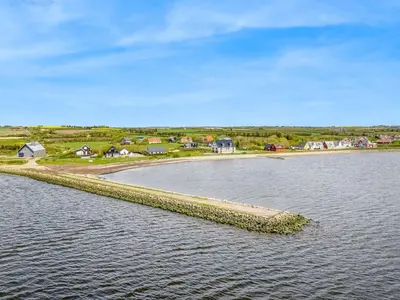 an island in the middle of a body of water at Holiday Home Edvardsine - 20m to the fjord by Interhome in Vestervig
