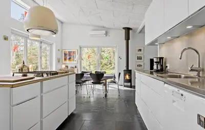 a kitchen with white cabinets and a counter top at Stunning Home In Bedsted Thy With Wifi in Bedsted Thy