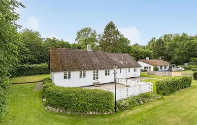 an image of a white house with a yard at Lejl 1 in Brovst