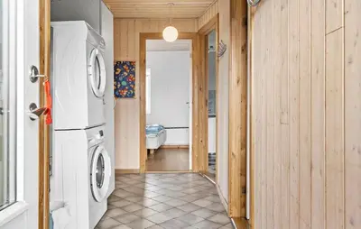 a laundry room with a washer and dryer at Nice Home In Harboøre With Kitchen in Harboør