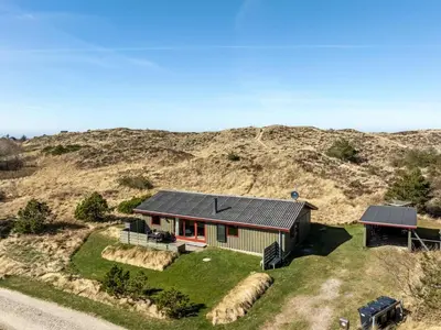 an aerial view of a house in the middle of a hill at Holiday Home Frandsine - 1-2km from the sea by Interhome in Thisted