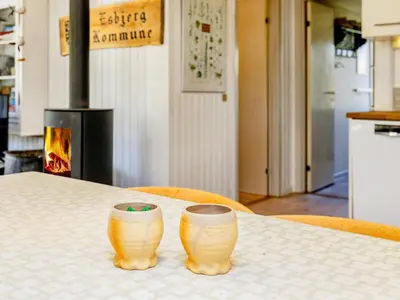 two cups sitting on top of a table at 8 person holiday home in Pandrup-By Traum in Pandrup