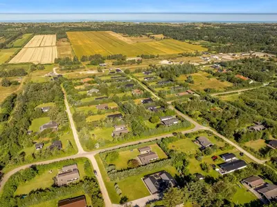 an aerial view of a farm with houses and trees at Holiday Home Ema - 1-9km from the sea by Interhome in Saltum