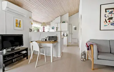 a small living room with a table and a couch at 3 Bedroom Gorgeous Home In Fur in Furland