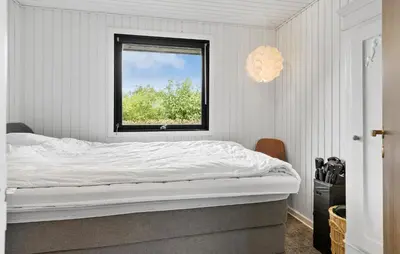 a white bedroom with a bed with a window at 3 Bedroom Cozy Home In Vinderup in Vinderup