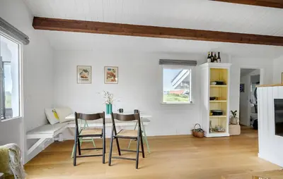 a dining room with a table and chairs at 2 Bedroom Lovely Home In Thisted in Thisted