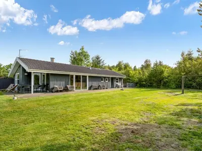 a house with a large yard in front of it at Holiday Home Ane - 800m from the sea by Interhome in Fjerritslev