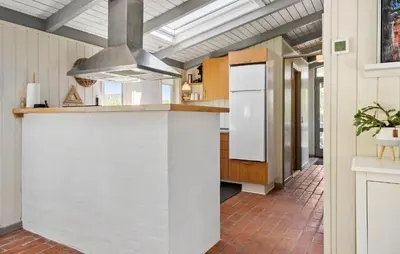 a kitchen with a white counter and a refrigerator at 3 Bedroom Beautiful Home In Vinderup in Vinderup