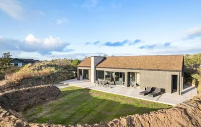 an aerial view of a house with a large backyard at 4 Bedroom Pet Friendly Home In Blokhus in Blokhus