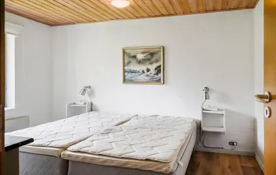 a bedroom with a large bed in a room at Nice Home In Harboøre With Wifi in Harboør