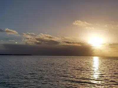 a sunset over a large body of water at 6 person holiday home in Spøttrup-By Traum in Lihme