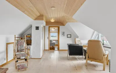 a living room with a wooden ceiling at Cozy Home In Øster Assels With Wifi in Øster Assels