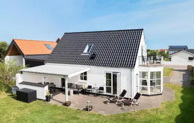 an aerial view of a white house with a patio at Beautiful Home In Thisted With Sauna in Thisted